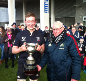 ack-ONeill-Captain-Old-Crescent-RFC-Under-20s-accepts-NOrth-Munster-U20-League-Trophy-from-Christy-Ryan-Secretary-North-Munster-Branch-after-25-6-win-over-Nenagh-Ormond-8-March-2015