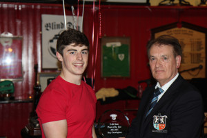 Rory Cunningham receives his Under 20 Player of the Year Award from President Dr Michael O'Flynn, Old Crescent RFC President's Awards 2014-15. 15 May 2015